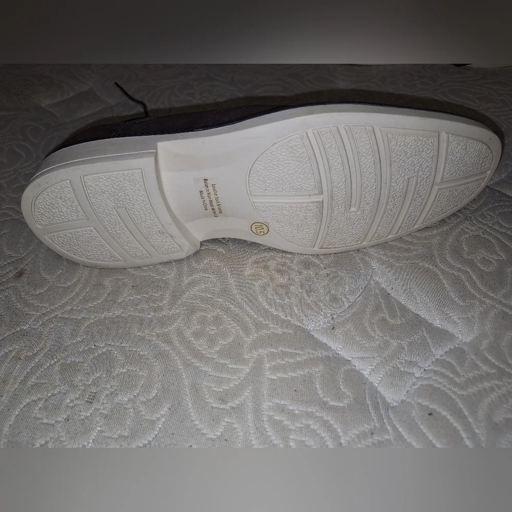 A pair of Franco Vanucci brown suede men's loafers in a size 10.5. EUC.